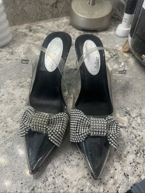 Express Clear Pointed Slingback Heels with Silver Rhinestone Bow
